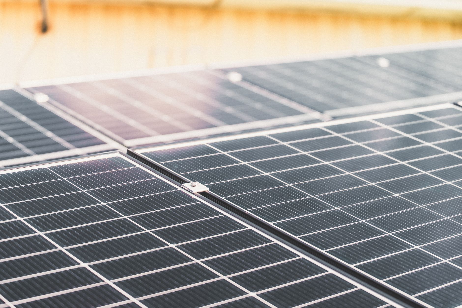 Portable bifacial solar panel tilted on snowy ground with cables